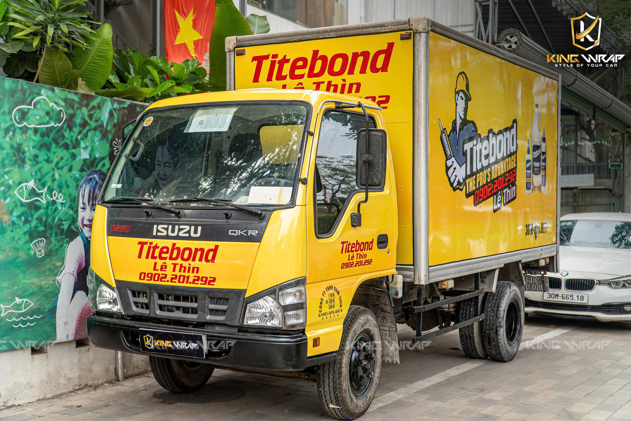 Dán tem QCDN trên xe tải tại KingWrap